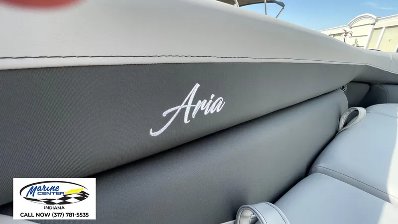Slide: The Image of 2025 Barletta Aria A24UC boat seating with logo, Marine Center contact details visible. - 13