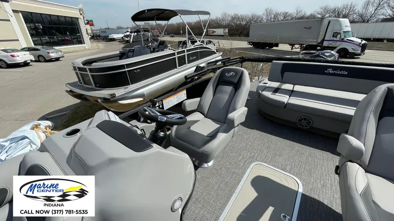 Slide: The Image of 2025 Barletta Aria A24UC pontoon boat at Marine Center Indiana dealership. - 14