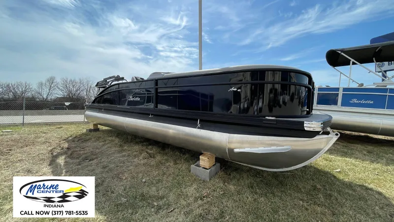 Slide: The Image of 2025 Barletta Aria A24UC pontoon boat displayed at Marine Center Indiana. - 20