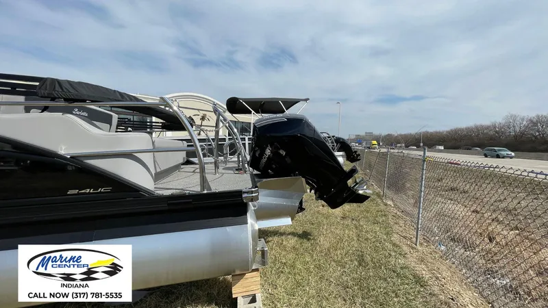 Slide: The Image of 2025 Barletta Aria A24UC pontoon boat displayed at Marine Center Indiana. - 23