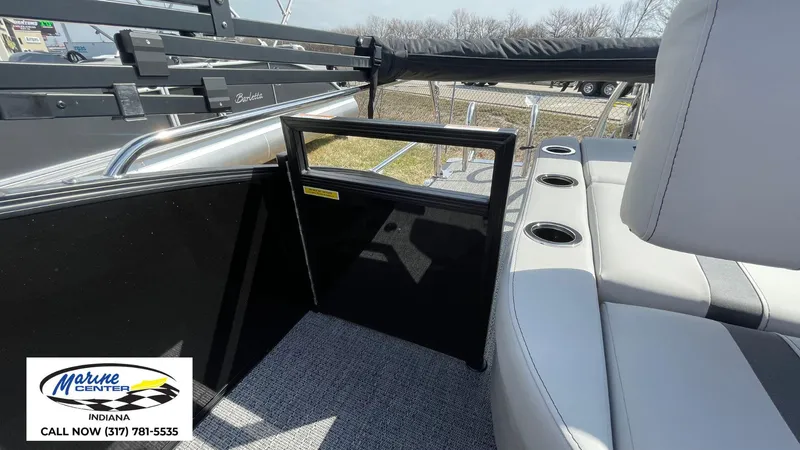 Slide: The Image of 2025 Barletta Aria A24UC pontoon boat interior with seating and cup holders. - 8