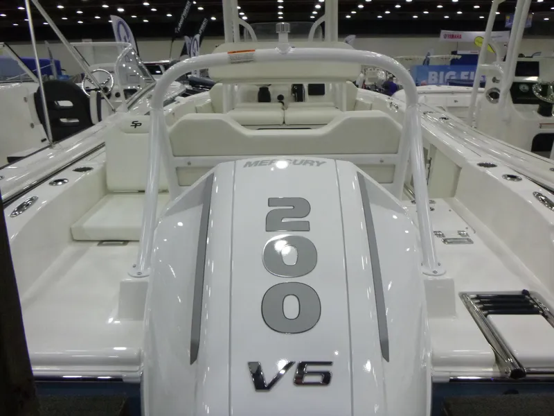 Slide: The Image of 2025 Sea Pro 225 Sandbar boat displayed at a marina show, priced at $87,144. - 11