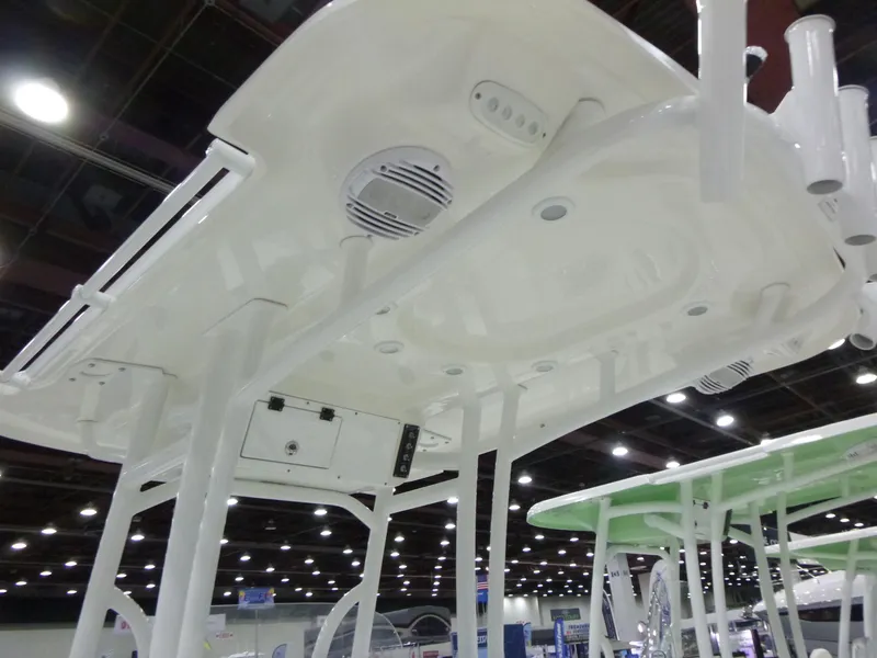 Slide: The Image of 2025 Sea Pro 225FLX Sandbar boat on trailer, side view, blue hull. - 6