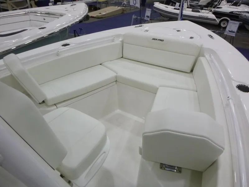 Slide: The Image of 2025 Sea Pro 225FLX Sandbar boat with outboard motor on trailer. - 7