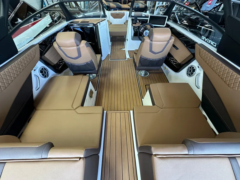 Slide: The Image of 2024 Yamaha 222SD jet boat interior with luxurious seating and modern dashboard. - 3
