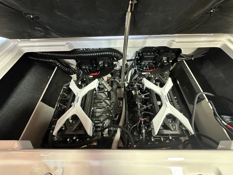Slide: The Image of 2024 Yamaha 222SD jet boat engine compartment with dual engines. - 9