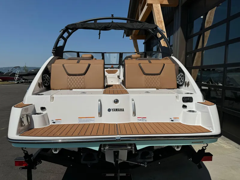 Slide: The Image of 2024 Yamaha 222SD jet boat rear view, featuring sleek design and comfortable seating. - 4