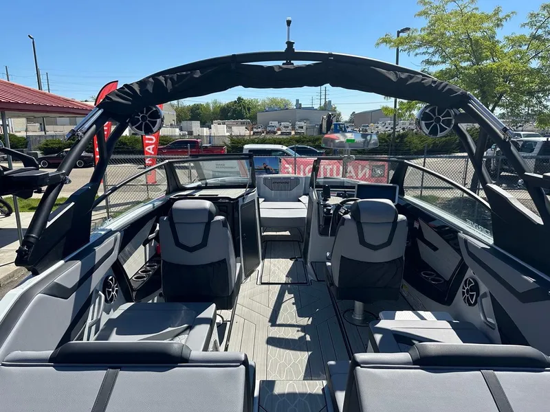 Slide: The Image of 2024 Yamaha 222XD jet boat interior with sleek seating and modern design. - 10