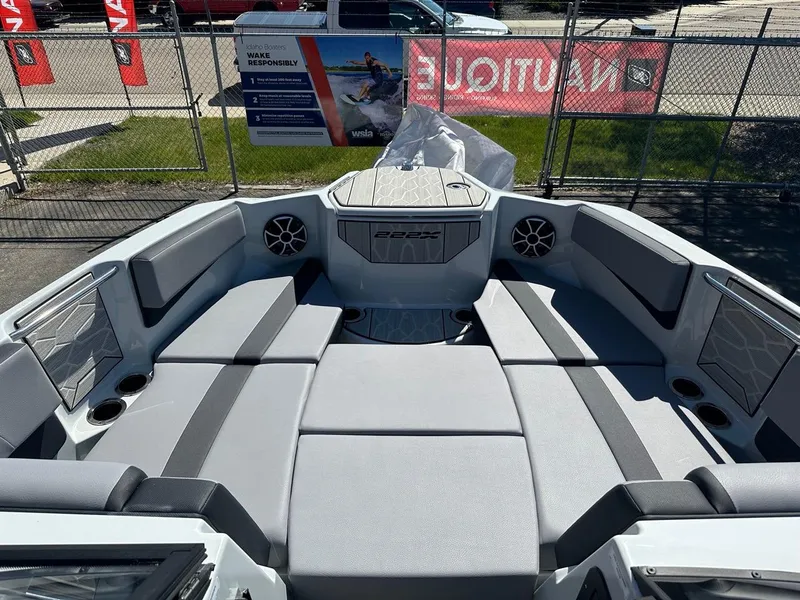 Slide: The Image of 2024 Yamaha 222XD jet boat interior with spacious seating and modern design. - 16