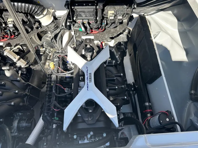 Slide: The Image of 2024 Yamaha 222XD jet boat engine compartment, showcasing high output components. - 22