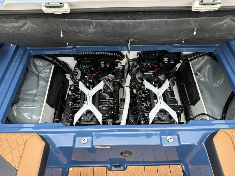 Slide: The Image of 2024 Yamaha 222XD jet boat engine compartment, showcasing dual engines and interior design. - 17