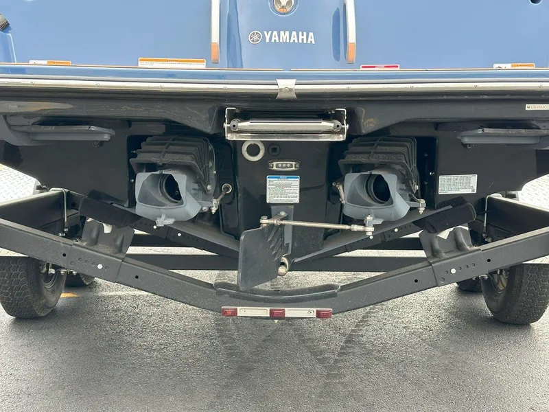 Slide: The Image of Rear view of 2024 Yamaha 222XD jet boat on trailer, showcasing dual jet propulsion system. - 9