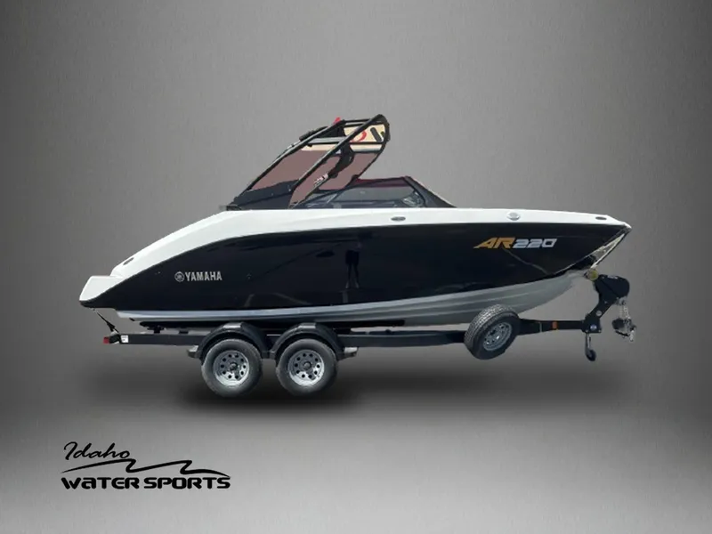 Slide: The Image of 2024 Yamaha AR220 jet boat on trailer, displayed by Idaho Water Sports. - 1