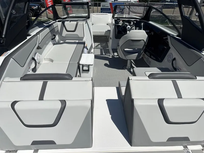 Slide: The Image of 2024 Yamaha AR220 jet boat interior with modern seating and sleek design. - 10