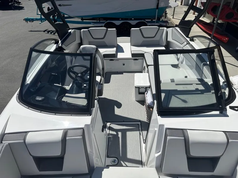 Slide: The Image of 2024 Yamaha AR220 jet boat interior with sleek seating and modern design. - 15