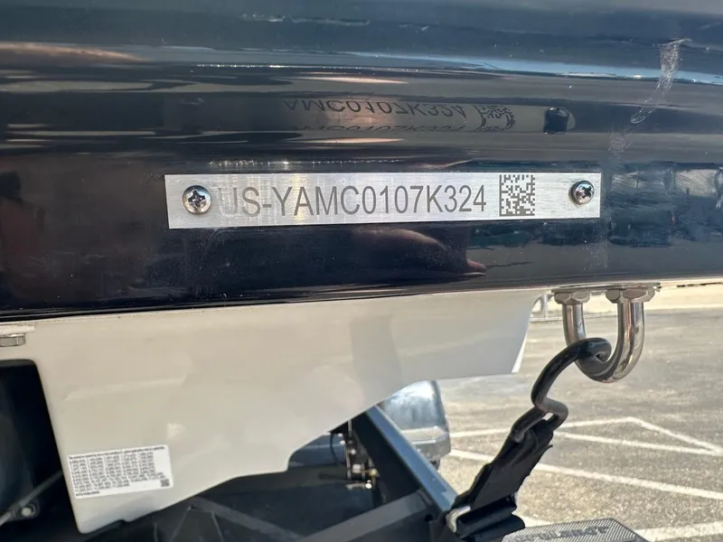Slide: The Image of 2024 Yamaha AR220 jet boat hull identification number plate with QR code. - 24