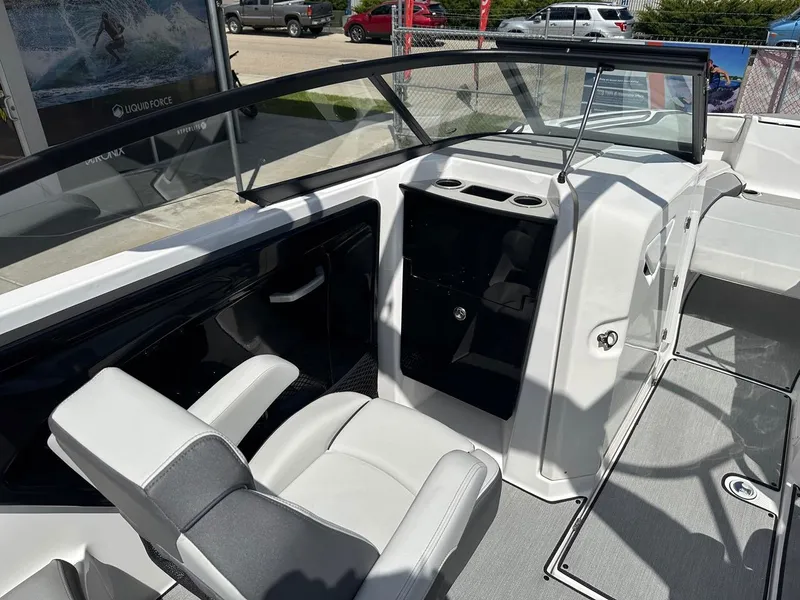 Slide: The Image of 2024 Yamaha AR250 jet boat interior with seating and dashboard view. - 15