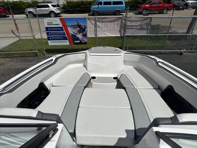 Slide: The Image of 2024 Yamaha AR250 jet boat interior with spacious seating and modern design. - 17