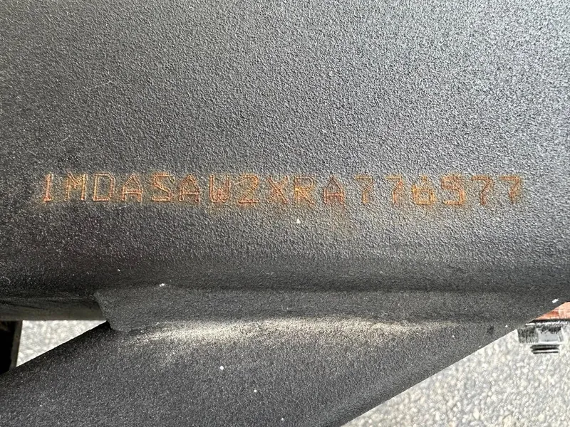 Slide: The Image of VIN number on a 2024 Yamaha AR250 jet boat hull. - 26