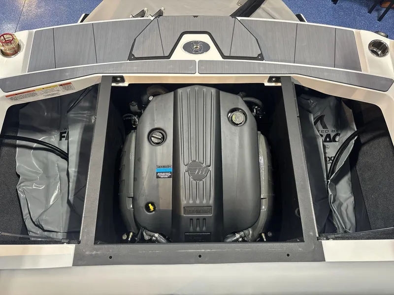 Slide: The Image of Engine compartment of a 2025 Axis A225 boat, showcasing the Monsoon engine. - 16