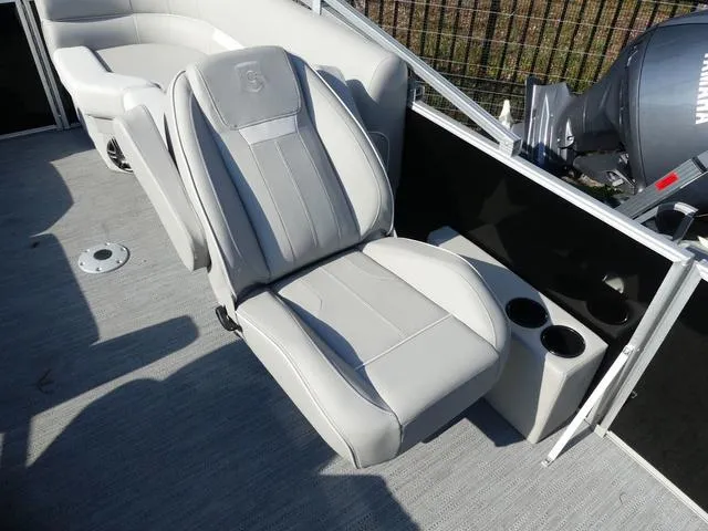 Slide: The Image of 2025 Godfrey Pontoons Xperience 2286 SBX interior seating with cup holders and modern design. - 10