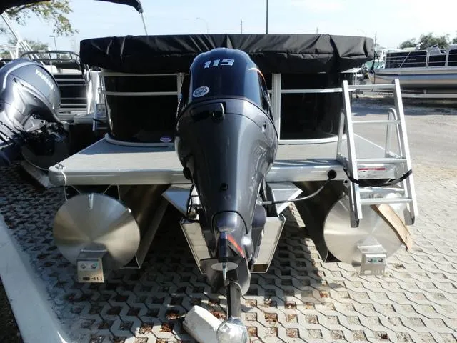 Slide: The Image of 2025 Godfrey Pontoons Xperience 2286 SBX with powerful outboard motor, rear view. - 5
