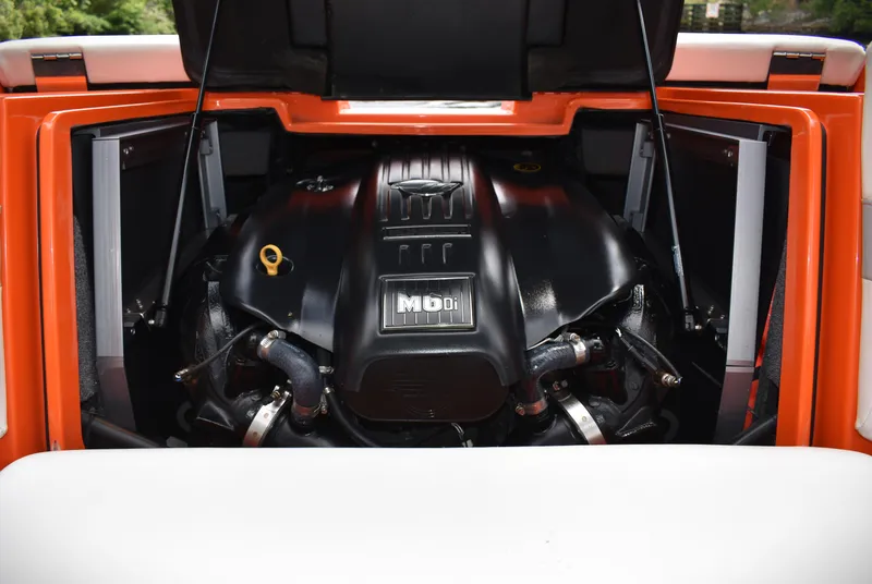Slide: The Image of 2020 Malibu Wakesetter 22 MXZ engine compartment with open hatch, showcasing the MDI engine. - 29