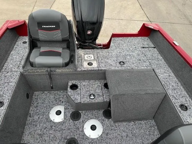 Slide: The Image of 2025 Tracker Pro Guide V-175 Combo boat interior with seating and storage compartments. - 8