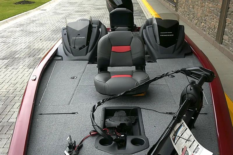 Slide: The Image of 2025 Tracker Pro Team 195 Tournament Edition boat interior with seating and equipment. - 3