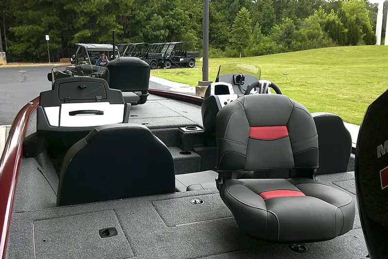 Slide: The Image of 2025 Tracker Pro Team 195 Tournament Edition boat interior with seating and controls. - 4