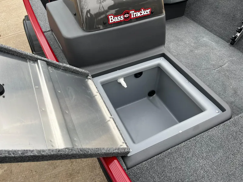Slide: The Image of 2025 Tracker Bass Tracker Classic XL boat with open storage compartment. - 15
