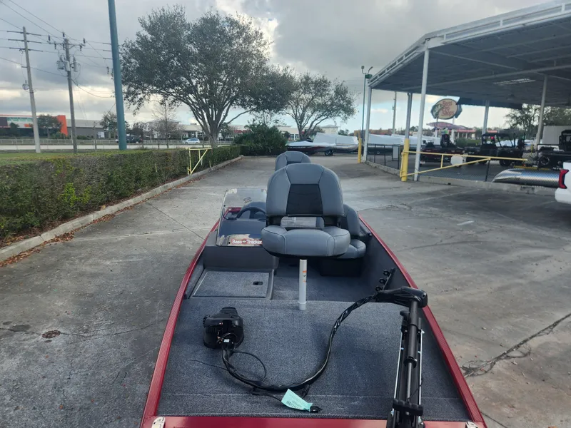 Slide: The Image of 2025 Tracker Bass Tracker Classic XL boat parked outdoors on concrete surface. - 4