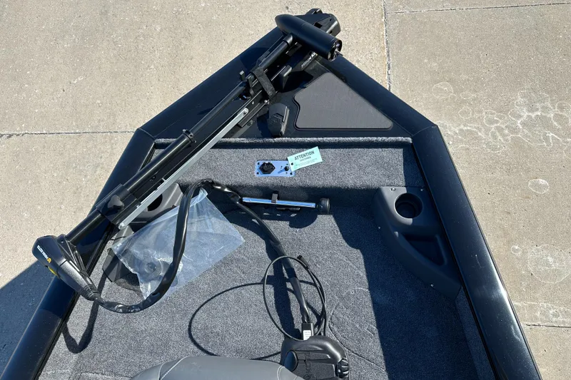 Slide: The Image of 2025 Tracker Pro Team 175 Crappie Edition boat deck with fishing equipment. - 3