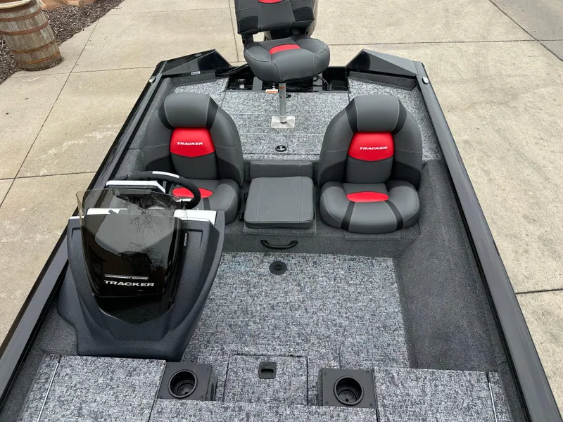 Slide: The Image of 2025 Tracker Pro Team 175 boat interior with gray and red seating, modern design. - 6