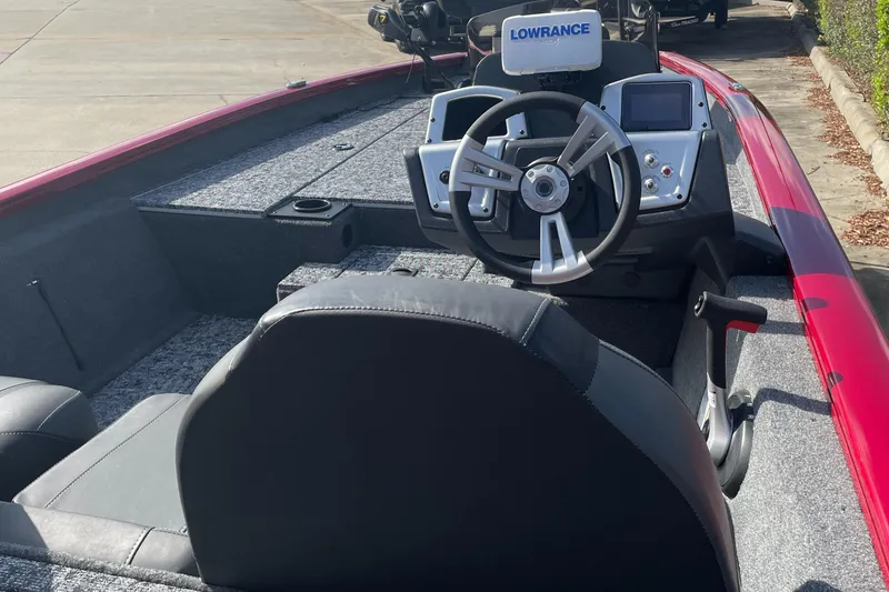 Slide: The Image of 2025 Tracker Pro Team 190 boat interior with steering wheel and Lowrance electronics. - 4