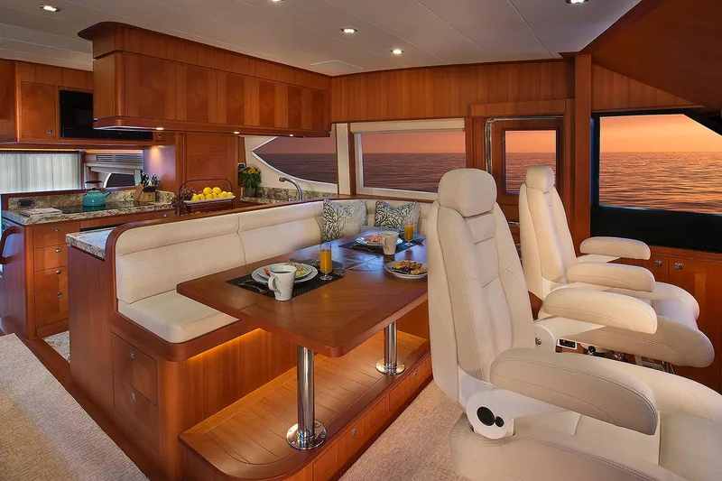 Slide: The Image of Luxurious interior of 2026 Hampton 650 Pilothouse yacht with elegant seating and ocean view. - 10