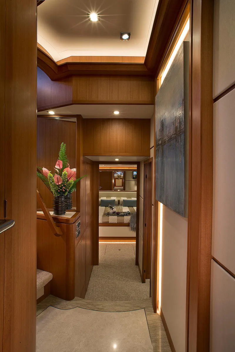 Slide: The Image of Luxurious interior of 2026 Hampton 650 Pilothouse yacht with elegant wood finishes. - 11