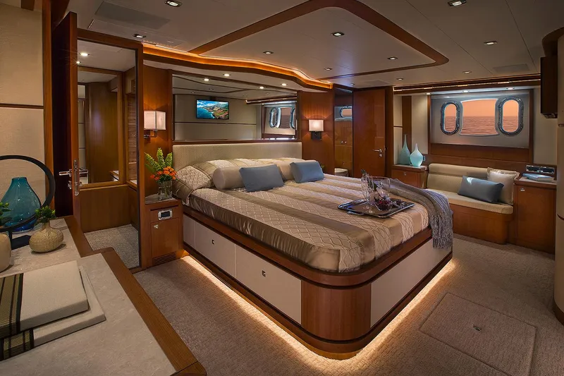 Slide: The Image of Luxurious bedroom interior of 2026 Hampton 650 Pilothouse yacht with elegant decor. - 17
