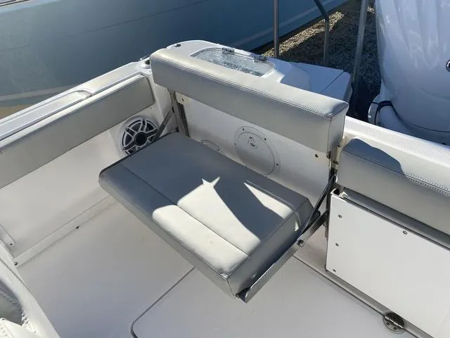 Slide: The Image of Anchor compartment of 2022 Everglades 235CC boat, open hatch view. - 12