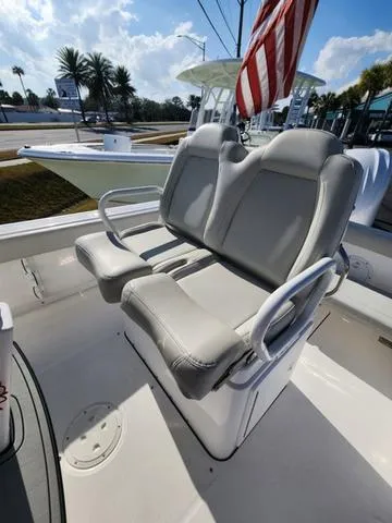 Slide: The Image of 2022 Everglades 235CC boat seats, gray upholstery, close-up view. - 14