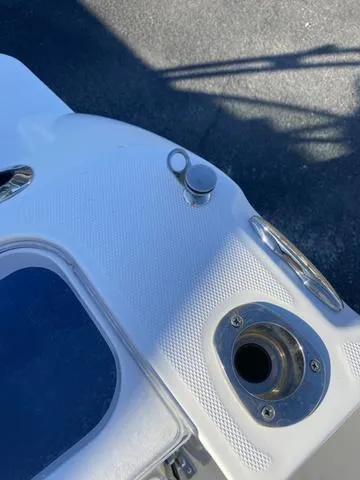 Slide: The Image of Interior view of 2022 Everglades 235CC boat cabin with seating. - 17