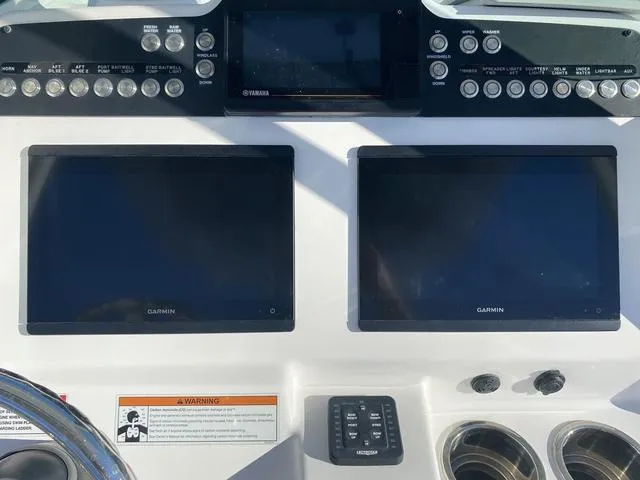 Slide: The Image of Open storage compartment on 2022 Everglades 235CC boat. - 29