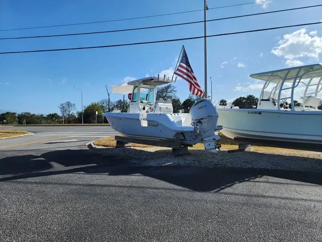 Slide: The Image of 2022 Everglades 235CC boat hull on gravel, side view. - 3