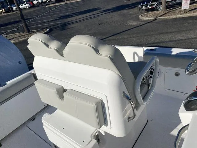 Slide: The Image of 2022 Everglades 235CC boat with foldable seating and speaker system. - 32