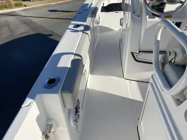 Slide: The Image of 2022 Everglades 235CC boat interior detail with control panel and seating. - 41