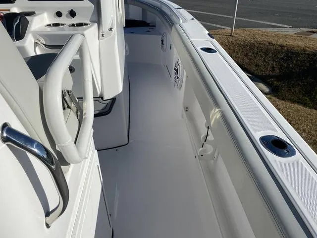 Slide: The Image of Cup holders on 2022 Everglades 235CC boat console. - 42
