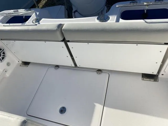 Slide: The Image of 2022 Everglades 235CC boat shower control and deck detail. - 43