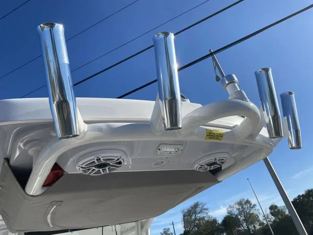 Slide: The Image of 2022 Everglades 235CC boat interior with speaker and storage compartments. - 48