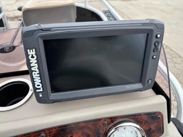 Slide: The Image of Lowrance Elite fish finder on 2021 Sun Tracker Bass Buggy 16 XL dashboard. - 16