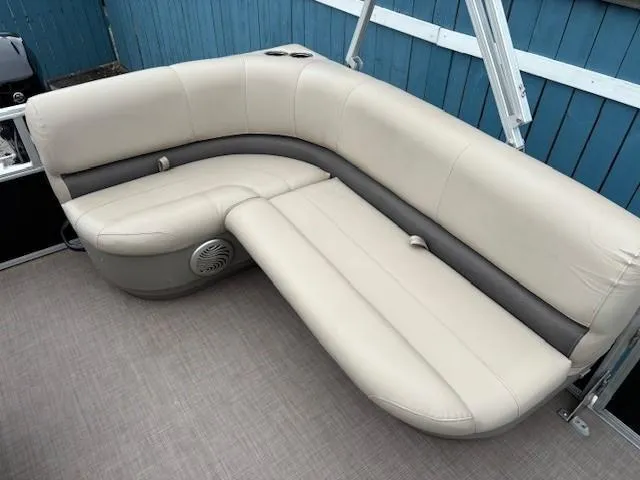 Slide: The Image of 2021 Sun Tracker Bass Buggy 16 XL boat seating, beige upholstery, corner layout. - 19